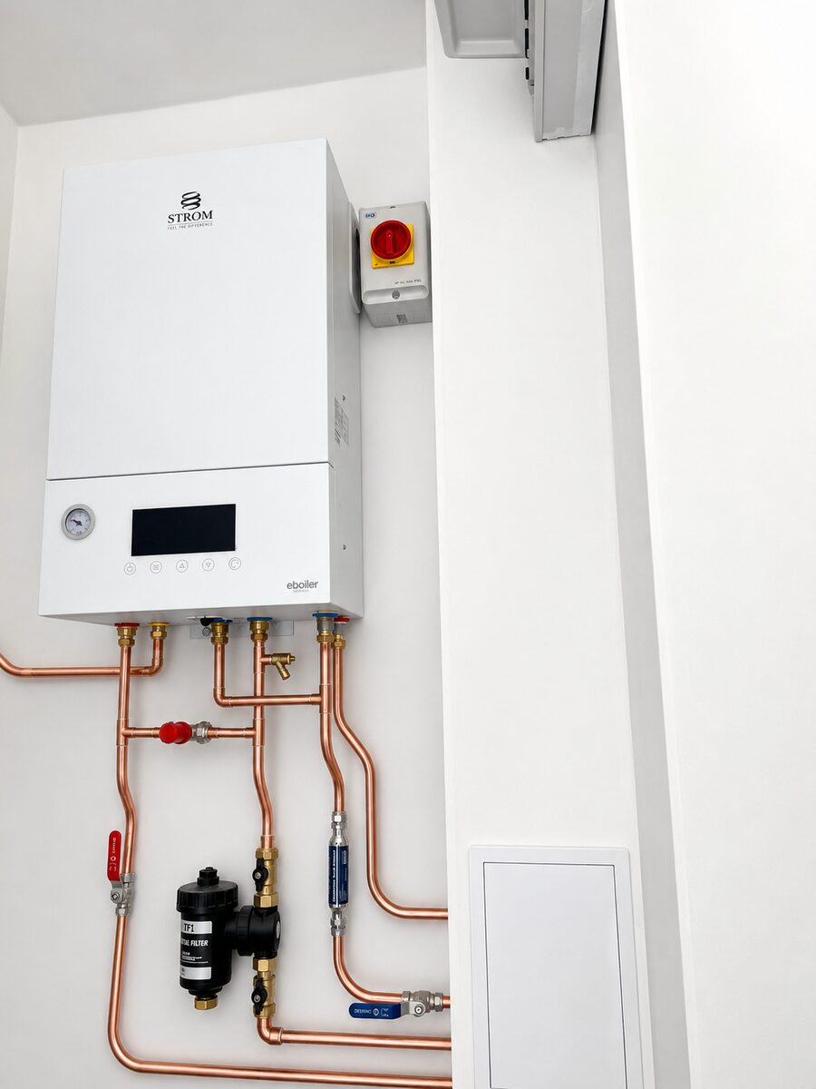 Strom electric combi boiler installed with copper pipework, North London