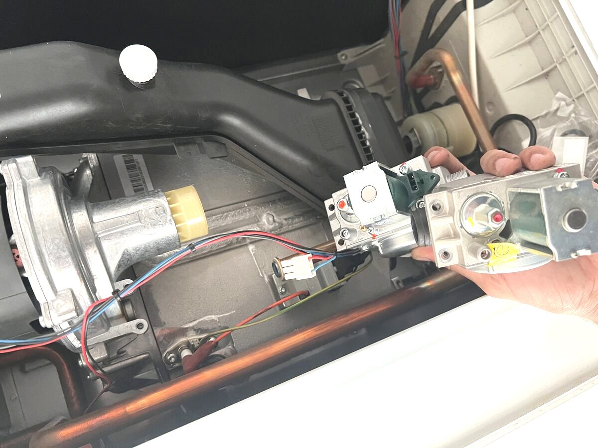 Boiler gas valve replacement in progress